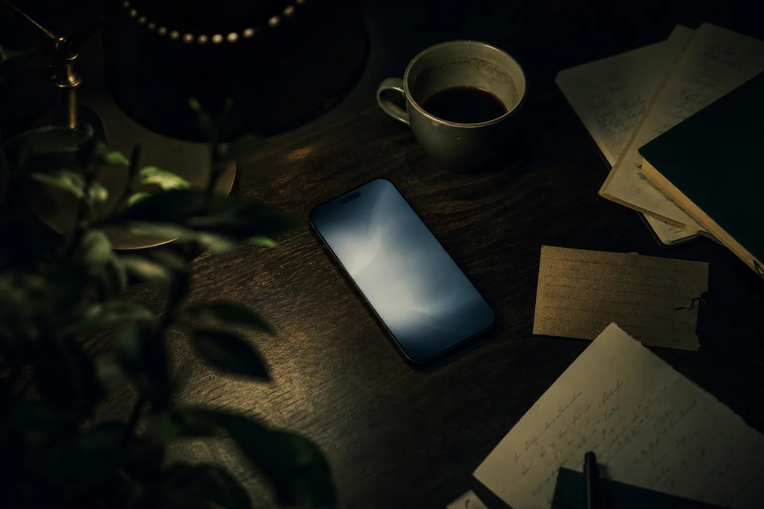 A late night spent researching hair loss options, phone glowing on a dark desk