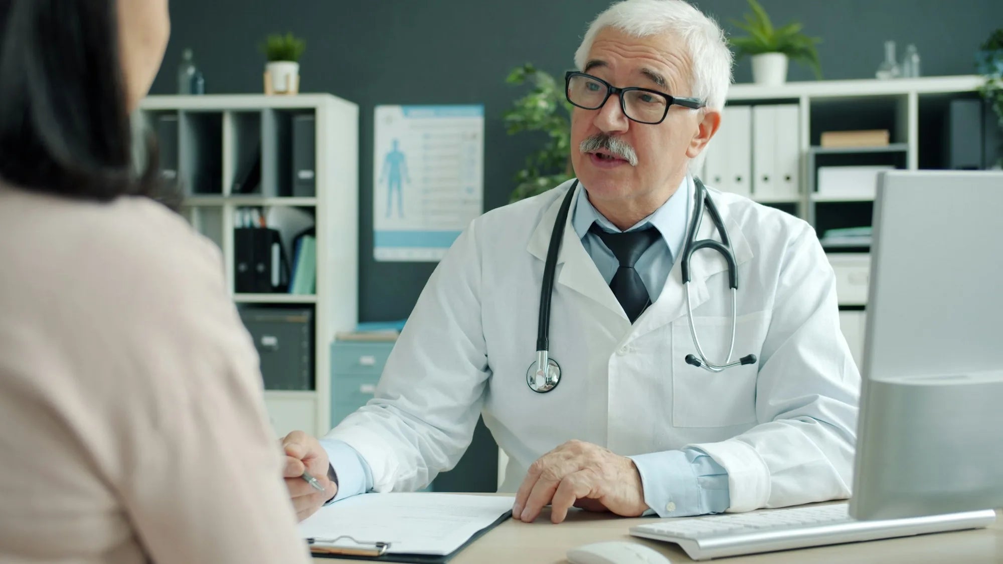 A doctor discussing treatment options with a patient during a medical consultation
