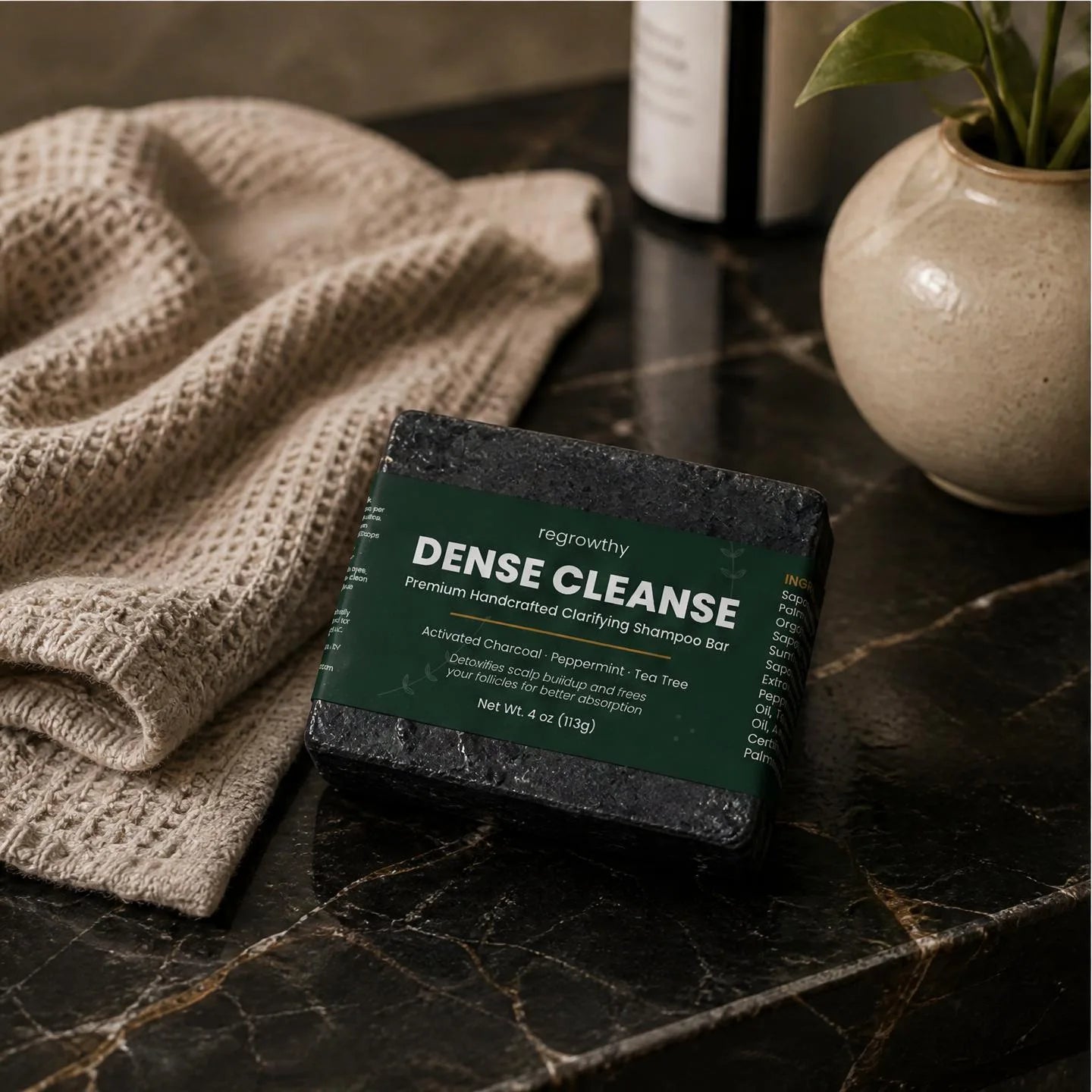 Dense Cleanse charcoal bar on the bathroom counter