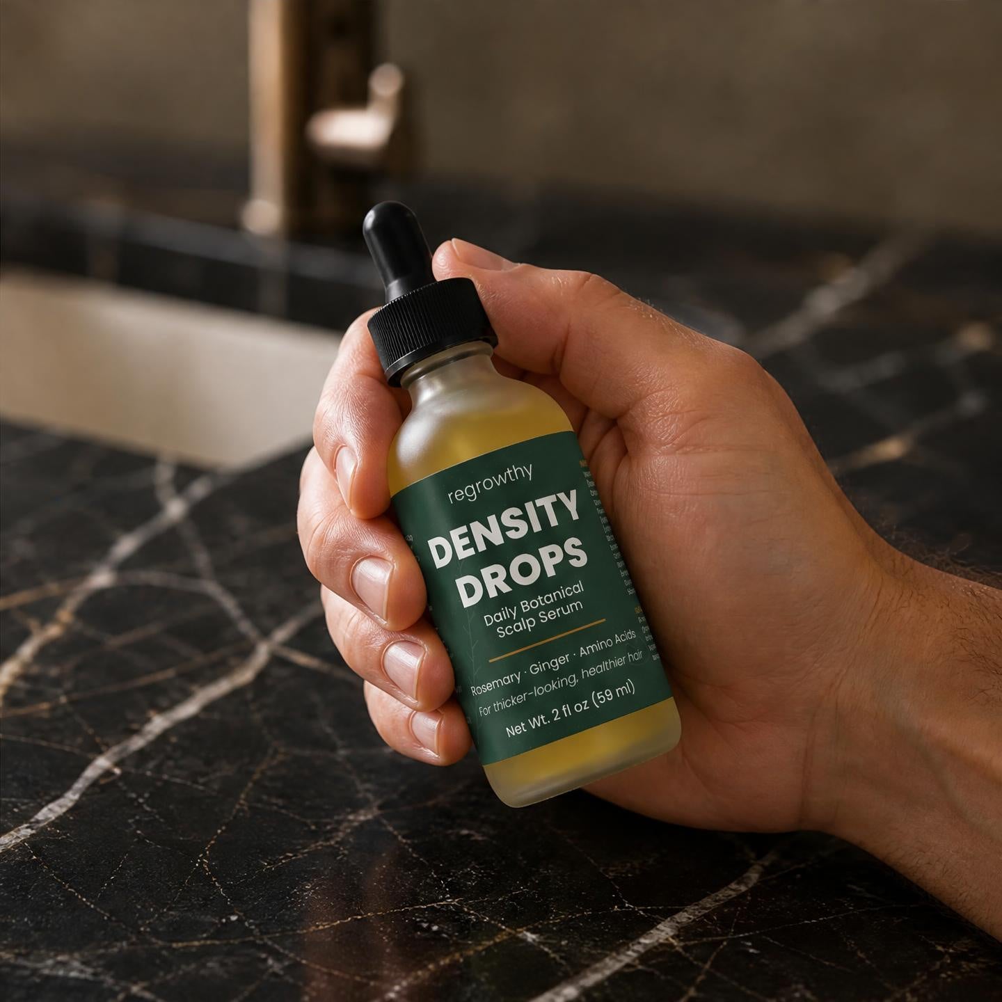 Density Drops bottle in hand